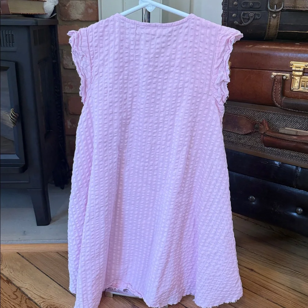 Pink textured seersucker dress is from the brand stem.Size 5